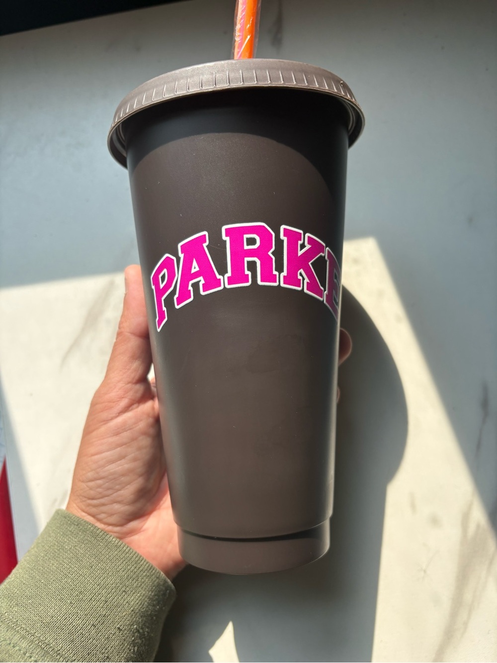 Parke Dunkin Donuts Brown Tumbler with Hot Pink Logo and Orange Straw